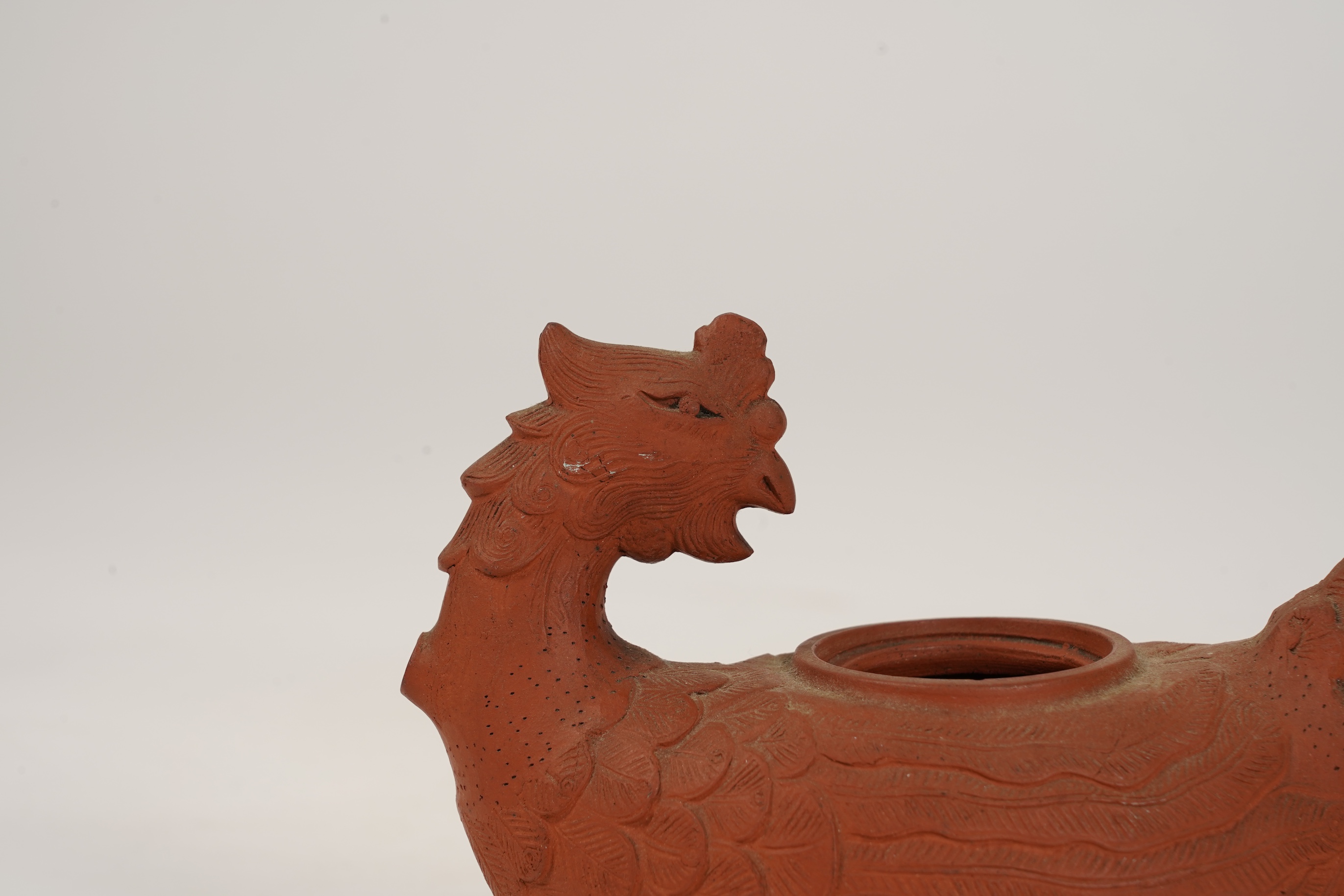 A Chinese Yixing 'Phoenix' teapot, late Qing dynasty
